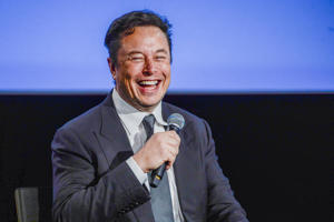 Tesla CEO Elon Musk now officially owns Twitter after trying to walk out of a  billion deal. Above, Musk smiles as he talks to guests at the Offshore Northern Seas 2022 (ONS) meeting in Stavanger, Norway, August 29, 2022 -- The meeting, which will take place in Stavanger from August 29 to September 1, 2022, will present the latest developments in Norway and international refers to the energy, oil and gas sectors.