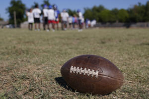A high school football team practices Wednesday, Sept. 28, 2022, in Oklahoma City. Oklahoma has passed a new law that prohibits elementary, middle, high school and college athletes from competing on sports teams of their gender identity if they are different from their birth gender. While more than a dozen other states have similar laws, Oklahoma is the only known state that requires "biological proof of sex" to participate. (AP Photo/Sue Agrotsky)