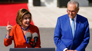 Senate Majority Leader Chuck Schumer of New York listens to House Speaker Nancy Pelosi of California as President Joe Biden announces HR 5376, the Inflation Reduction Act of 2022, on the South Lawn of the room. Bianca will sign the presentation in Washington. , September 13, 2022. AP Photo / Andrew Harnick