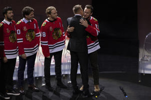 Former Blackhawks star Marian Hossa greets Jonathan Teves and other former teammates at the jersey launch event at the United Center on Sunday, November 20, 2022.