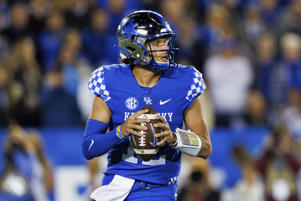 FILE - Kentucky's Qaya Sharon looks for a wide receiver during the first half of an NCAA college football game against South Carolina in Lexington, Kentucky, Oct. 8, 2022. Iowa (7-5) vs. Kentucky (7-5) Saturday, December 31, 2022 in the Music City Bowl. (AP Photo/Michael Clubb, File)