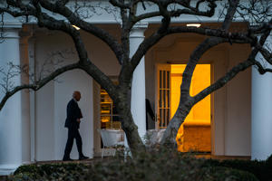 President Biden makes his way to the Oval Office on Wednesday.