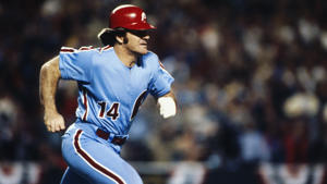 Pete Rose walks #14 for the Philadelphia Phillies against the Kansas City Royals in October 1980 at Royals Stadium in Kansas City, Missouri. Focus on sports via Getty Images.
