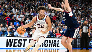 Anthony Watson (22) of the Gonzaga Bulldogs (22) throws a ball against Alex Karaban (11) of the Connecticut Huskies (11) during the 2023 NCAA Elite Tournament at the T-Mobile Arena on March 25, 2023 in Las -Vegas. Photo by Brett Wilhelm/NCAA via Getty Images