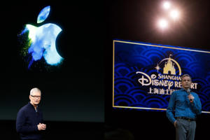 Apple, Inc. CEO Tim Cook at the 2016 product launch event and Bob Iger, CEO of The Walt Disney Company, held a 2016 press conference at the Shanghai Disney Resort. Stephen Lamb/Johannes Eisele/Getty Images