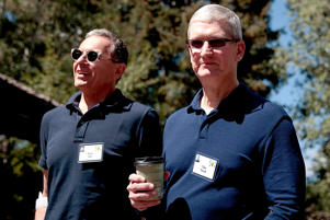 Walt Disney Company CEO Bob Iger walks with Apple Inc. CEO Tim Cook as they attend the Allen & Company Sun Valley Annual Conference on July 6, 2016 in Sun Valley, Idaho. Every July, some of the world's richest and most powerful business leaders in media, finance, technology and politics gather at Sun Valley Resort for a special week-long conference. Anger/Getty Images
